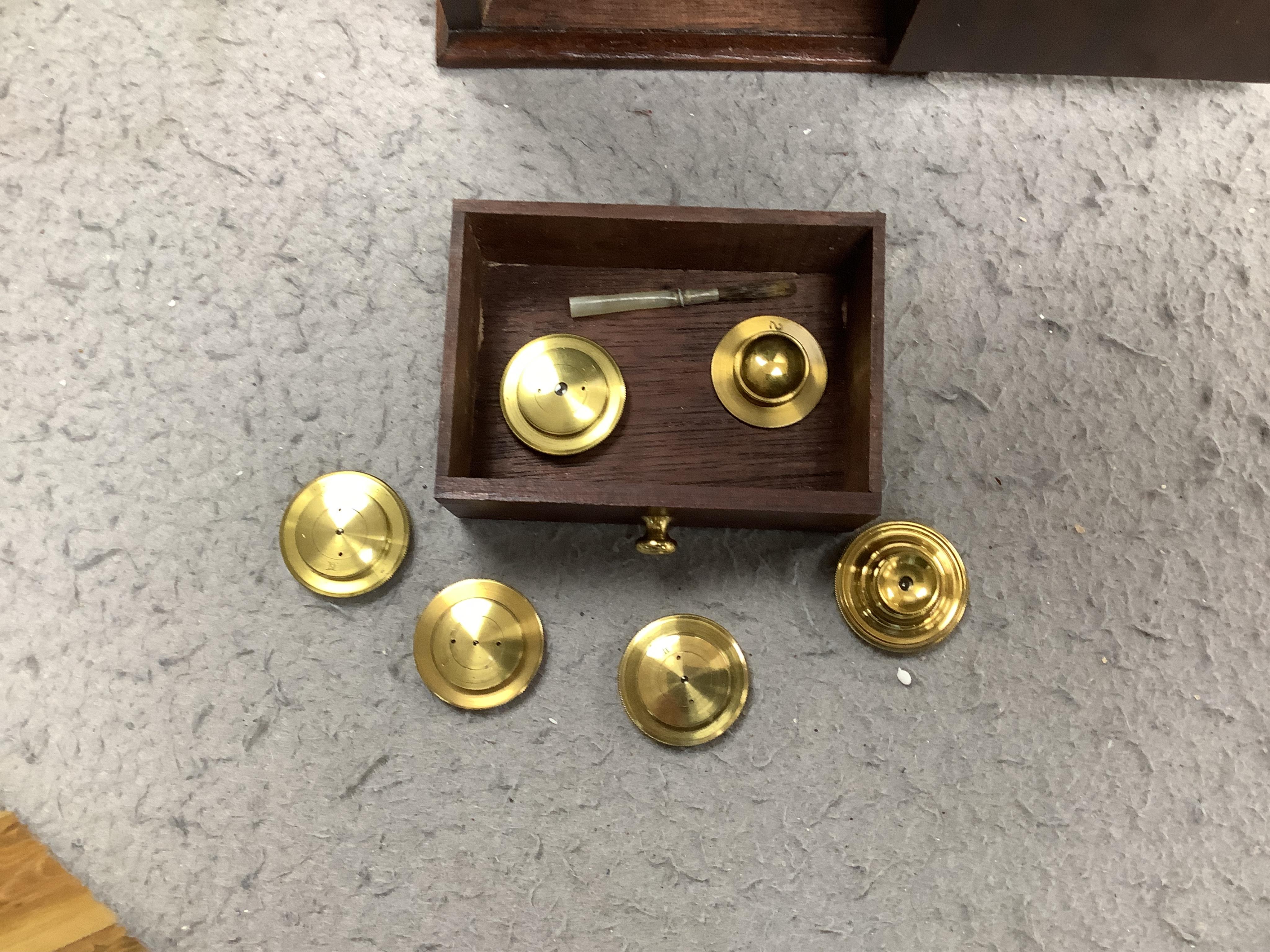 A cased reproduction W.R. Feat 18th century Culpeper style brass microscope, 20cm high, spare lenses in drawer of case. Condition - good.